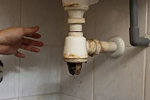 Professional drain cleaning in progress